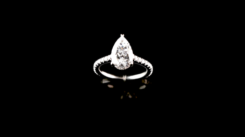 Pear Shape Hidden Halo Solitaire with Pave Set Cathedral Band and Bridge